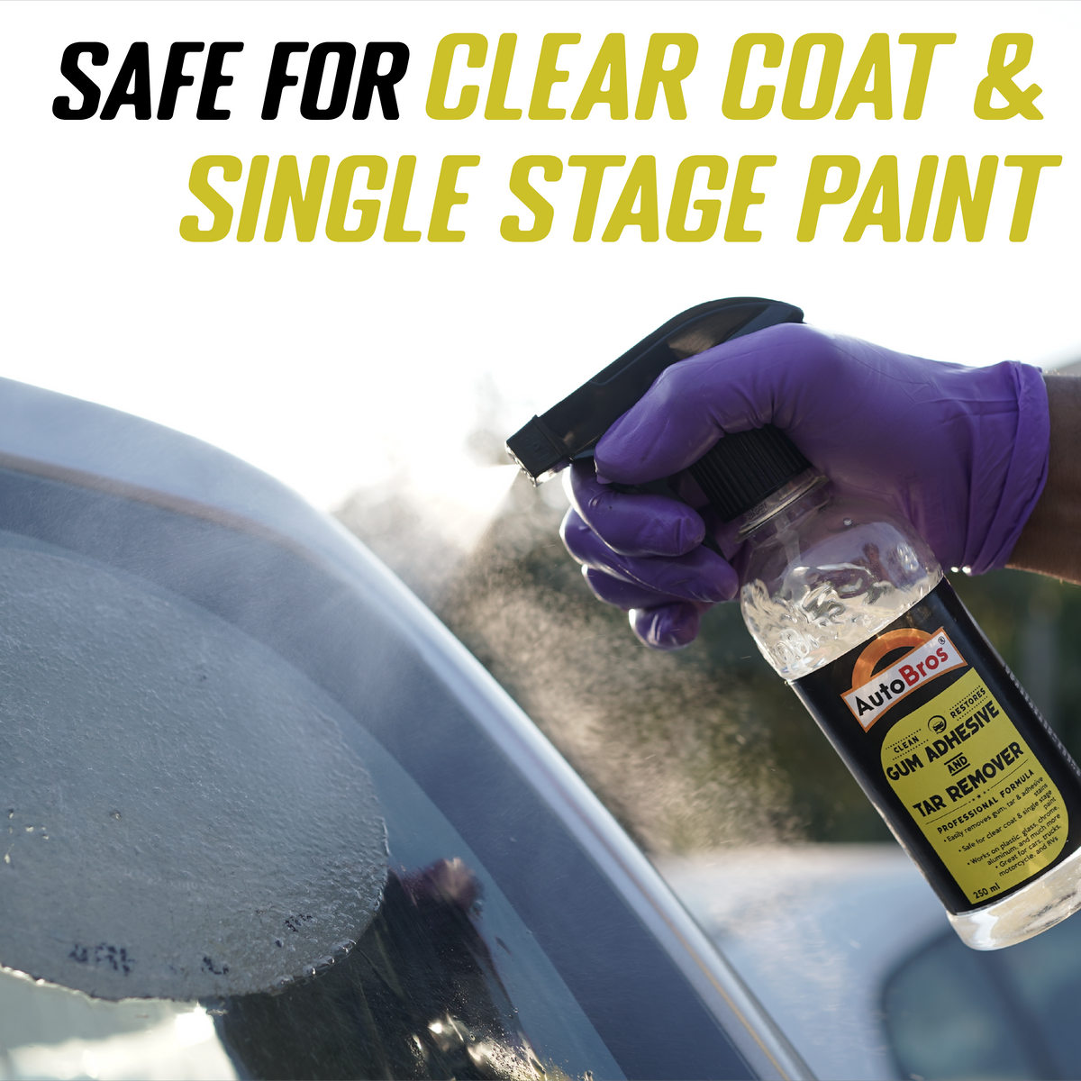 Hand wearing a purple glove holding a bottle of car detailing product with text 'Safe for clear coat & single stage paint' above.